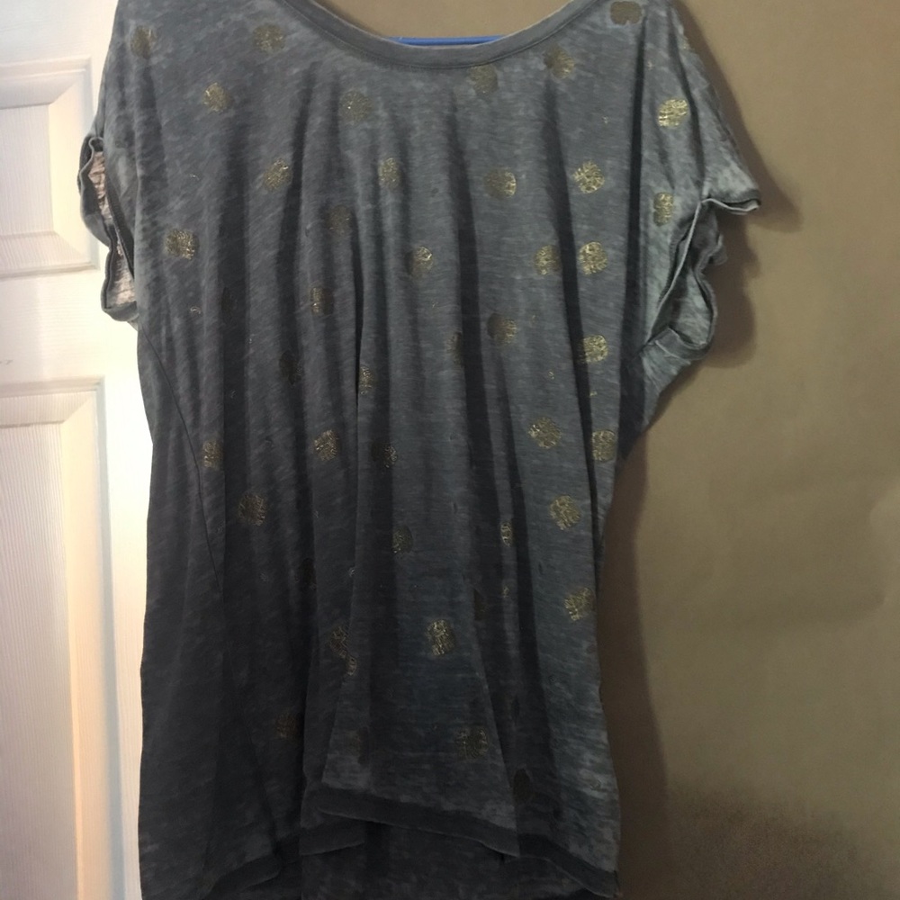 Grey and gold colored tee-shirt, used